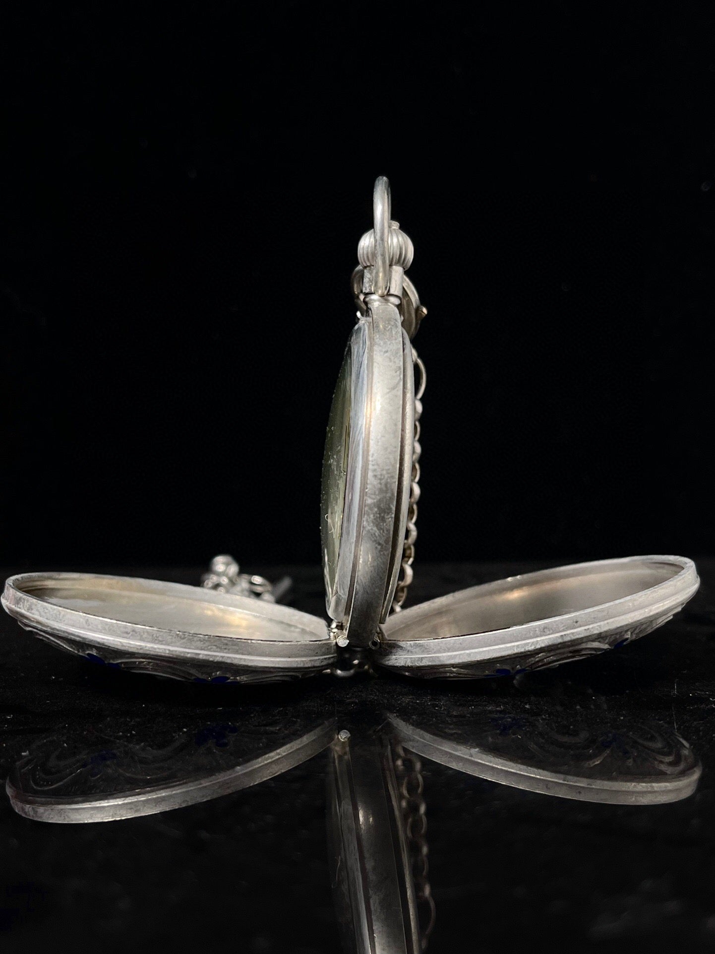 Chinese antique double opening pocket watch with sun, moon, and stars
