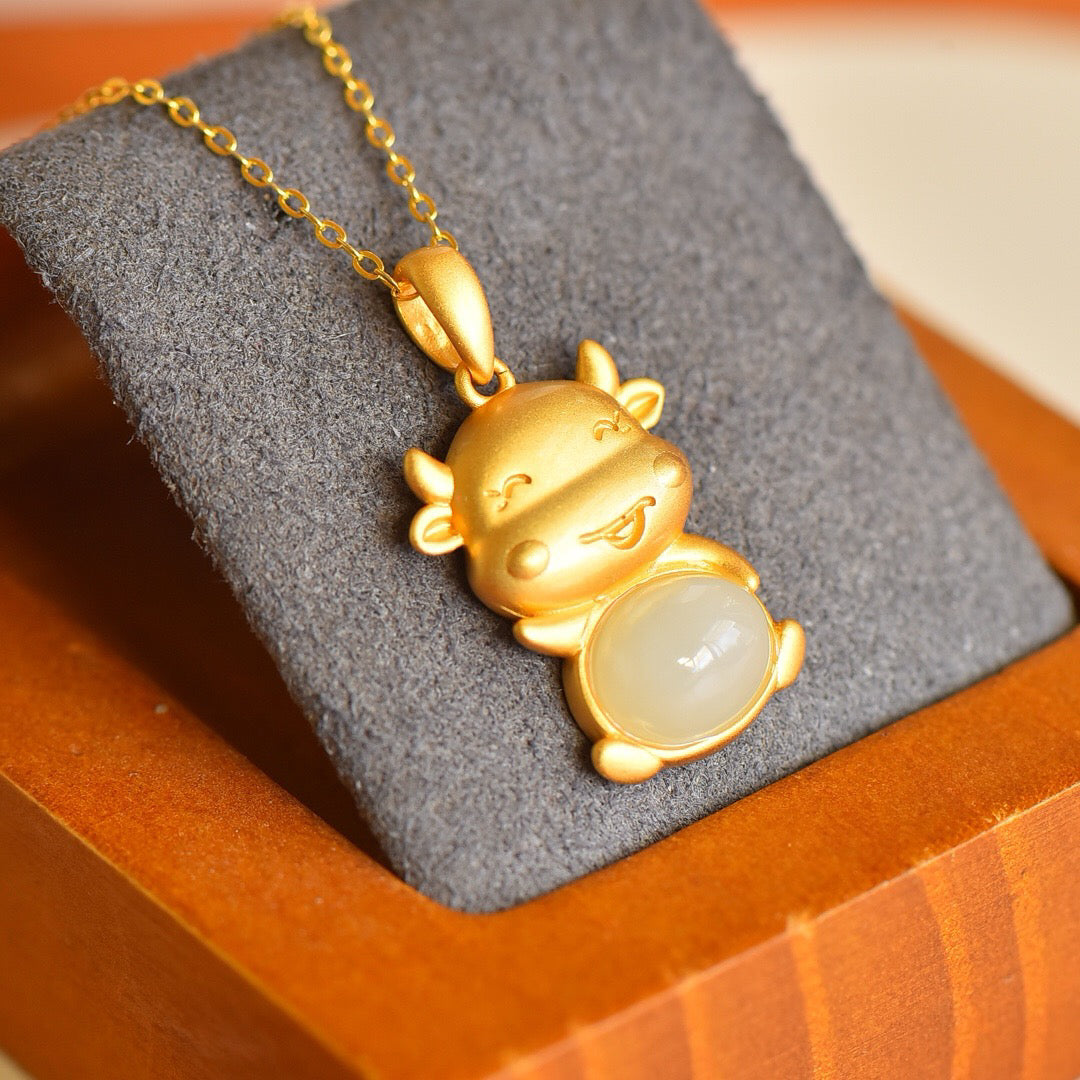 Silver inlaid Hetian Jade Silver Ox Pendant