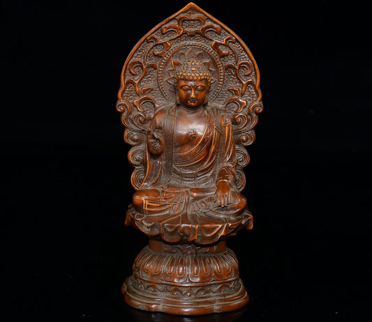 Small leaved boxwood with north facing Buddha ornaments