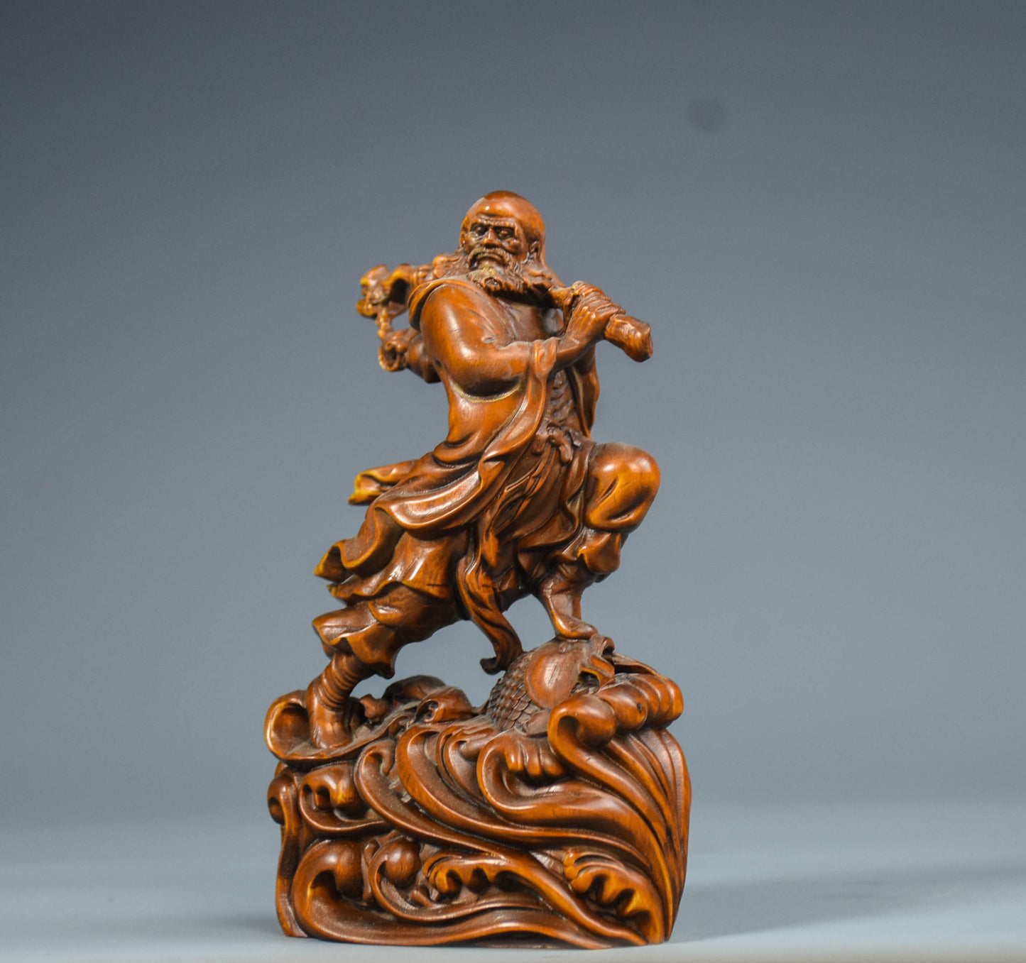 Treasured boxwood carving with reeds crossing the river, Damo