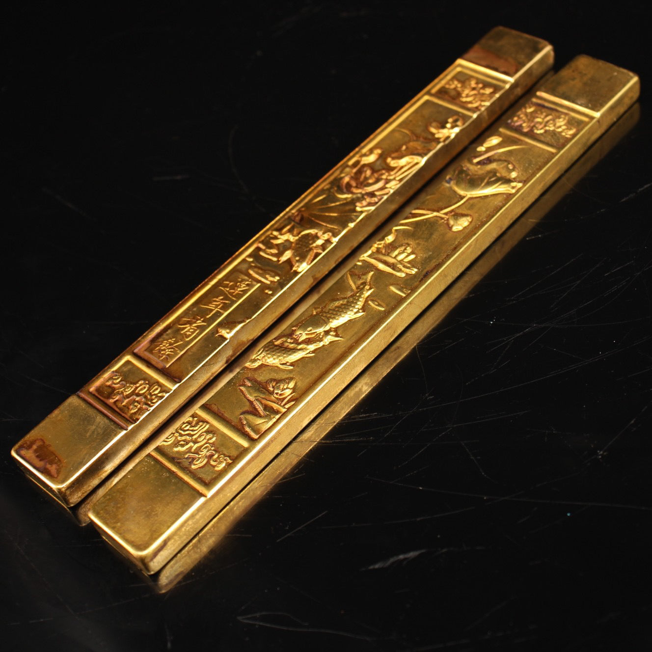 A pair of handmade pure copper gilded town rulers crafted from Chinese antiques