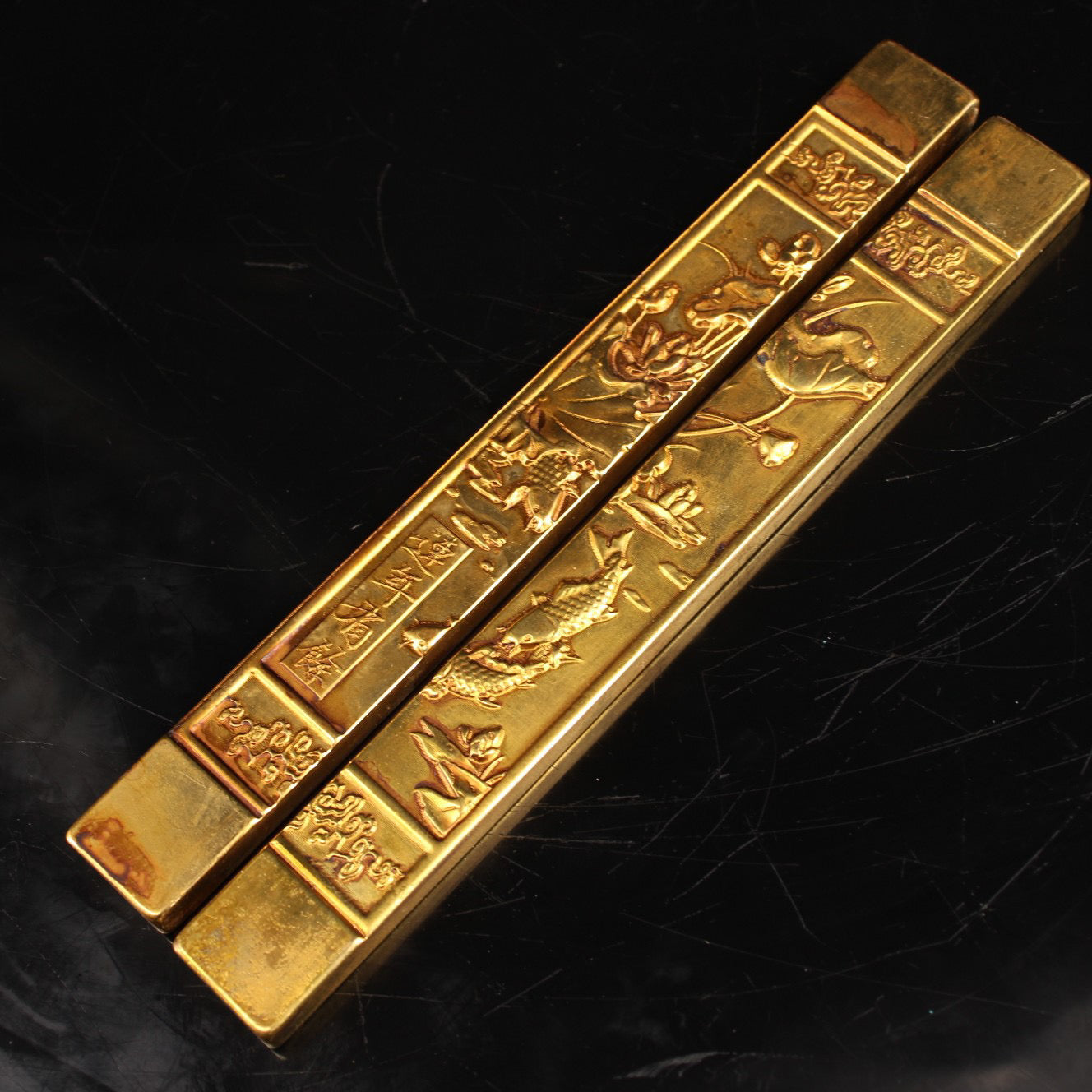 A pair of handmade pure copper gilded town rulers crafted from Chinese antiques