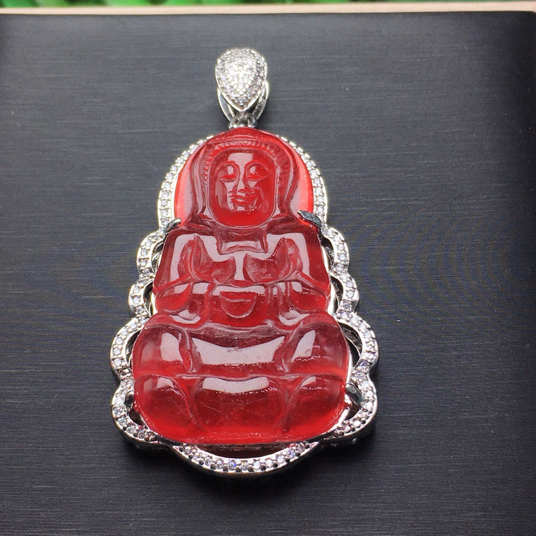 Ice red jade inlaid with Guanyin