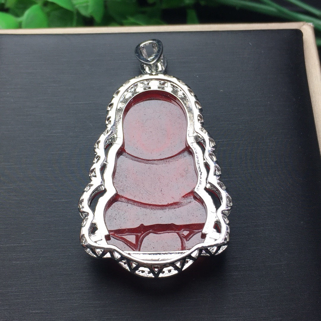 Ice red jade inlaid with Guanyin