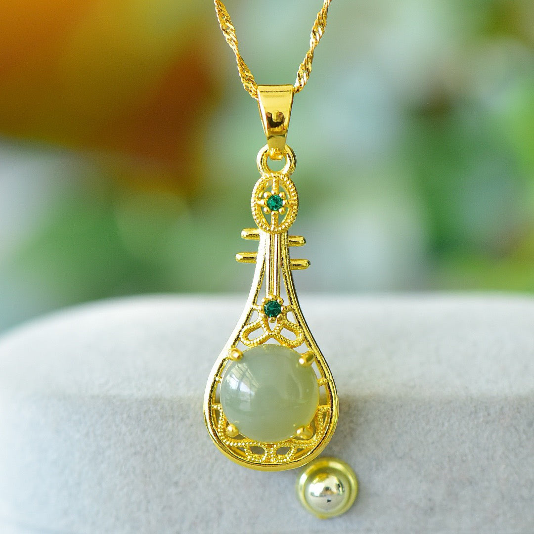 Copper inlaid Hotan Jade hollow pipa with green zirconium fashion pendant