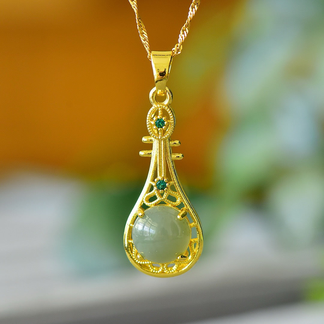 Copper inlaid Hotan Jade hollow pipa with green zirconium fashion pendant
