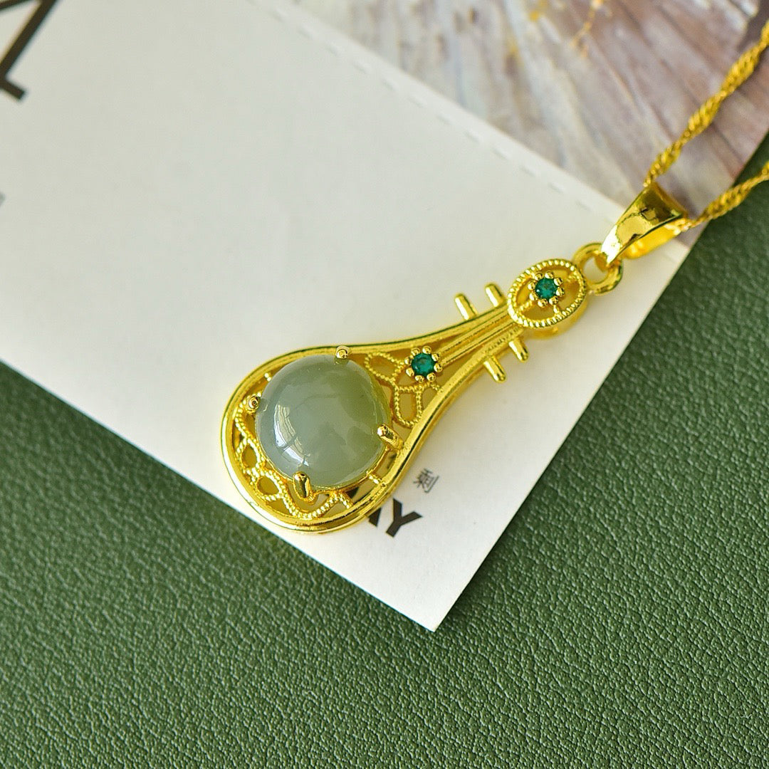 Copper inlaid Hotan Jade hollow pipa with green zirconium fashion pendant