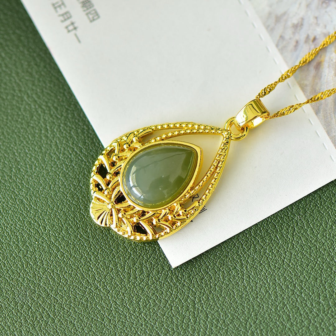 Copper inlaid Hotan Jade heart shaped hollow fashionable pendant