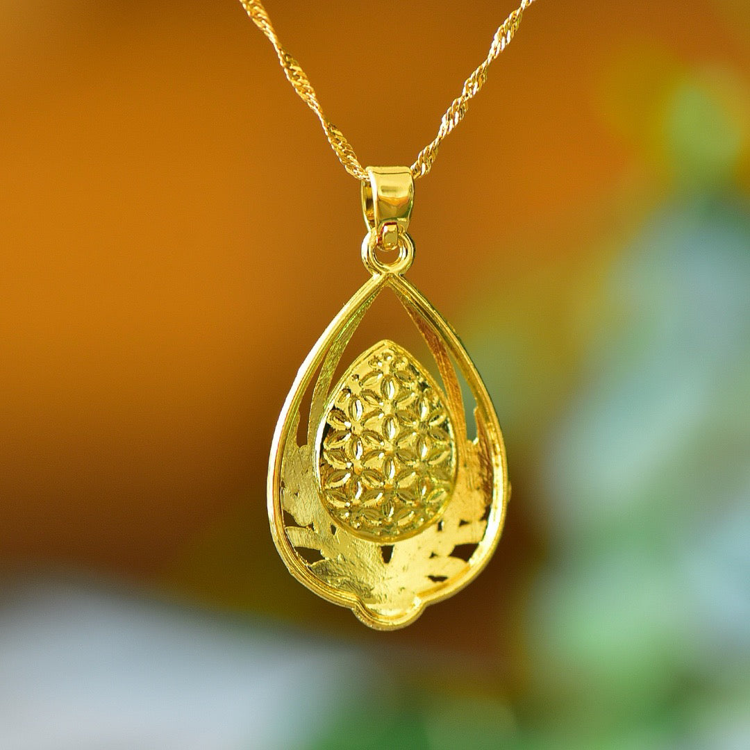 Copper inlaid Hotan Jade heart shaped hollow fashionable pendant