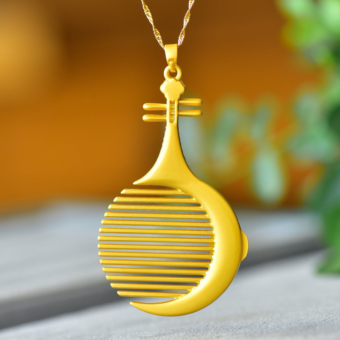 Copper inlaid Hotan Jade drum face pipa comb fashion pendant