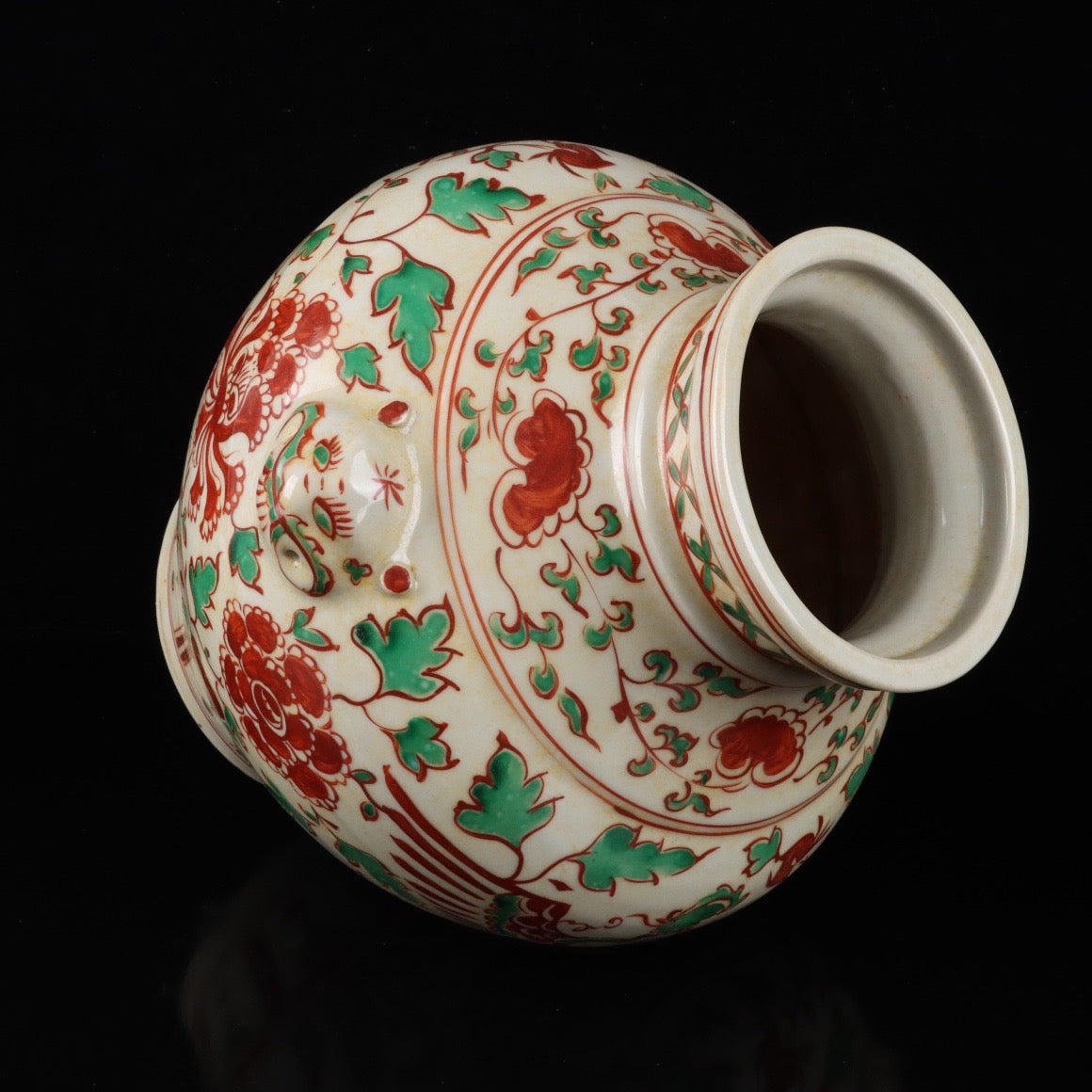 Red and green colorful phoenixes wearing peony patterned animal ear jars