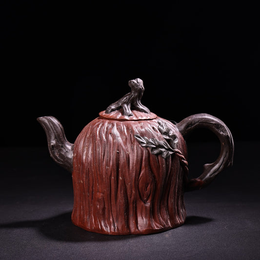 A red clay and purple clay teapot