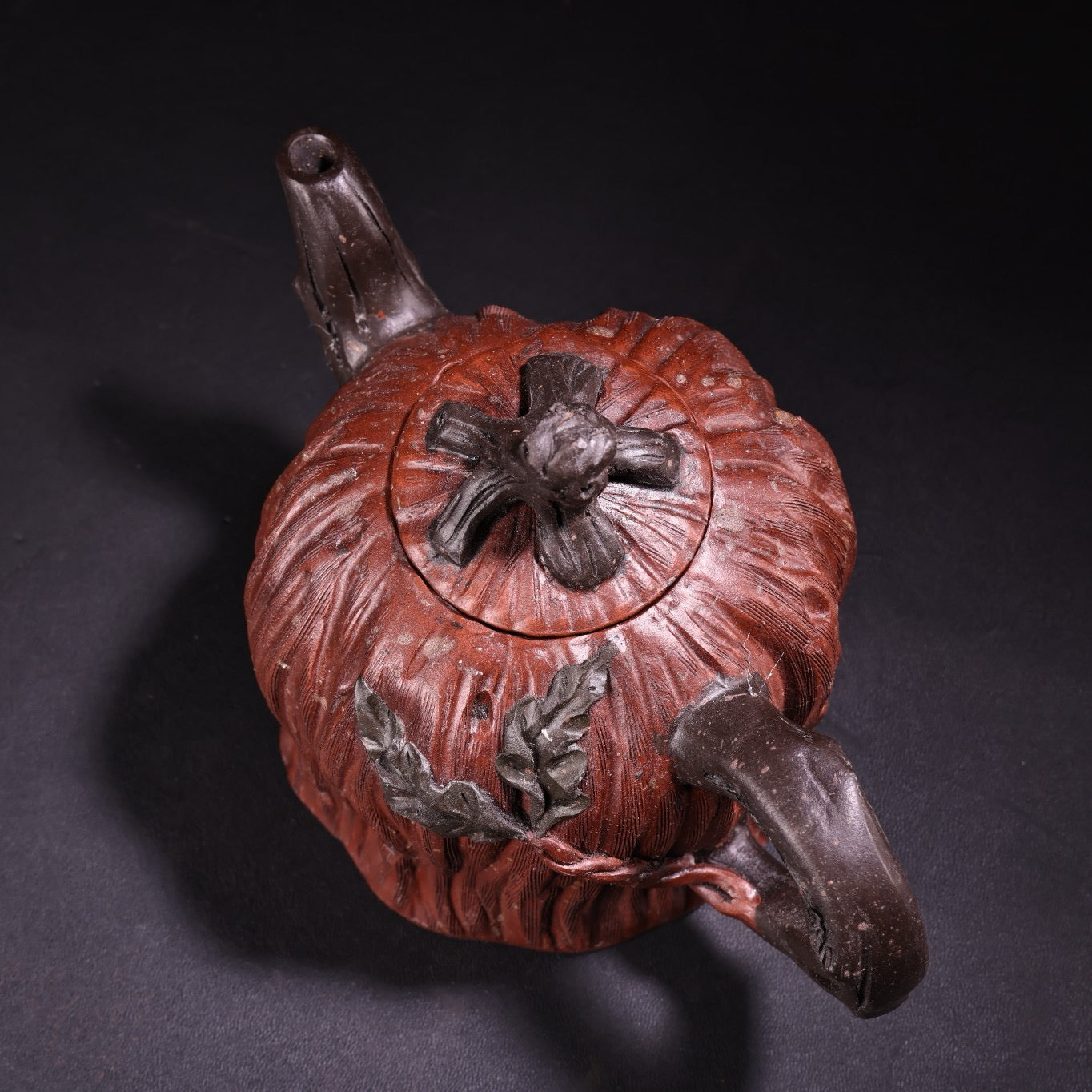 A red clay and purple clay teapot