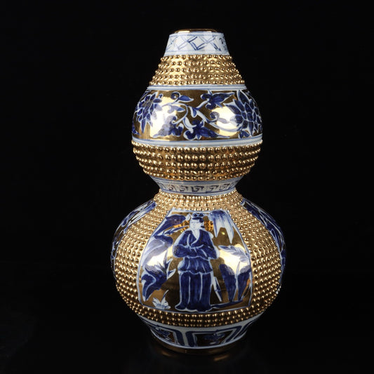 Blue and white gilded character story patterned gourd vase