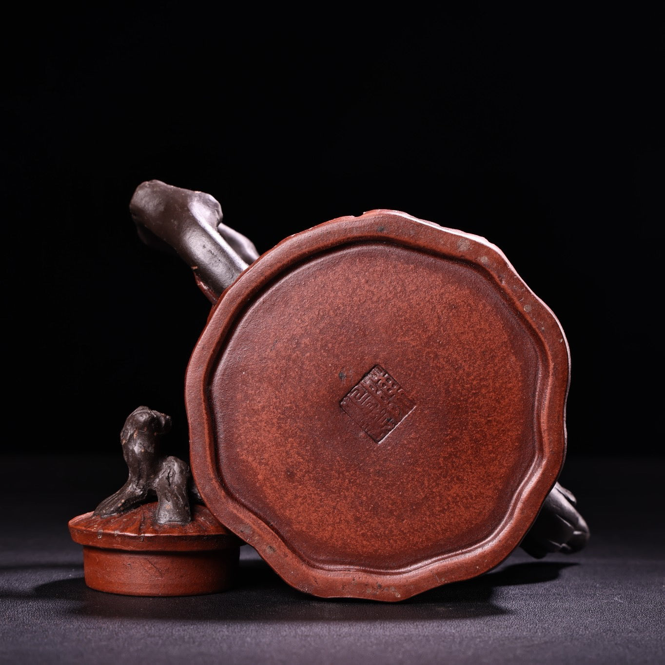 A red clay and purple clay teapot