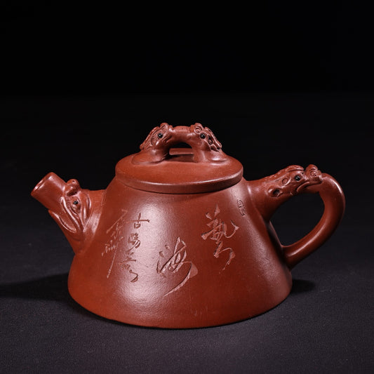 A red clay and purple clay teapot