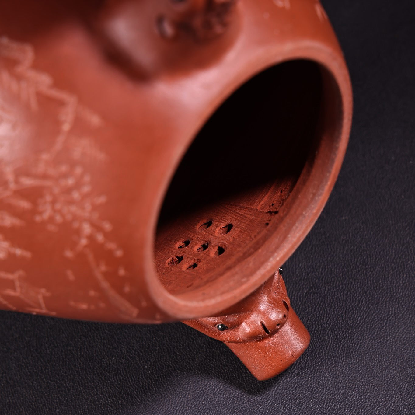 A red clay and purple clay teapot