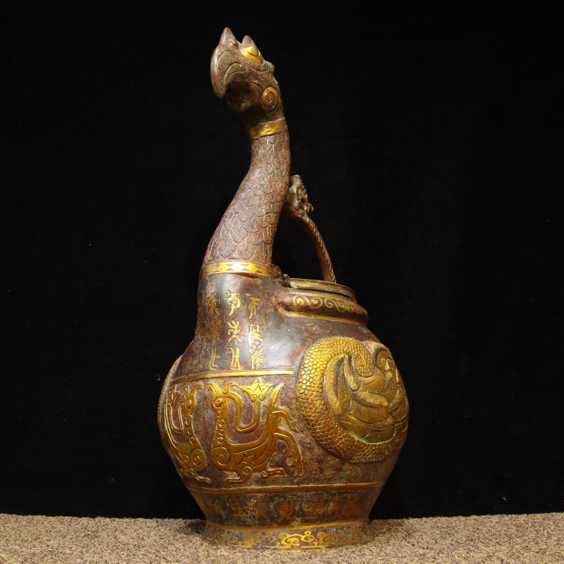 Chinese antique bronze - inlaid gold dragon and phoenix carrying beam teapot