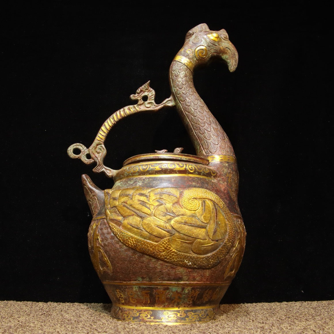 Chinese antique bronze - inlaid gold dragon and phoenix carrying beam teapot