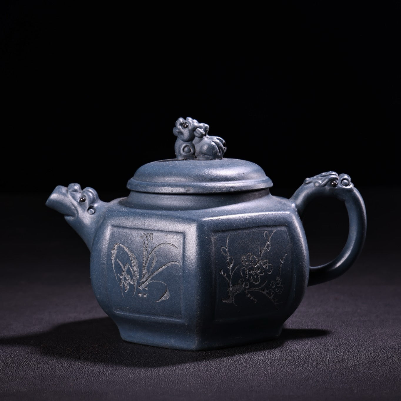 A handmade raw ore azure purple clay teapot