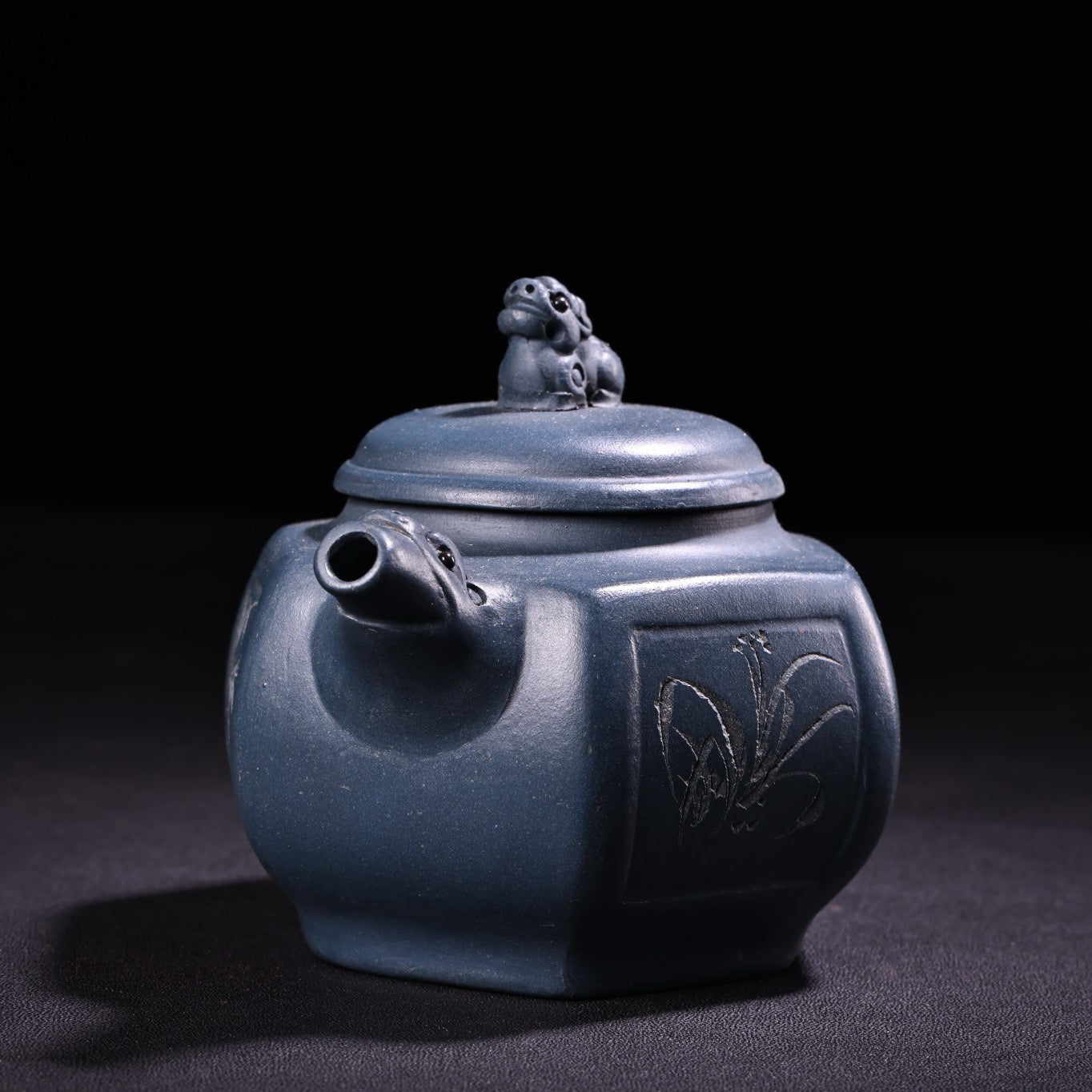 A handmade raw ore azure purple clay teapot