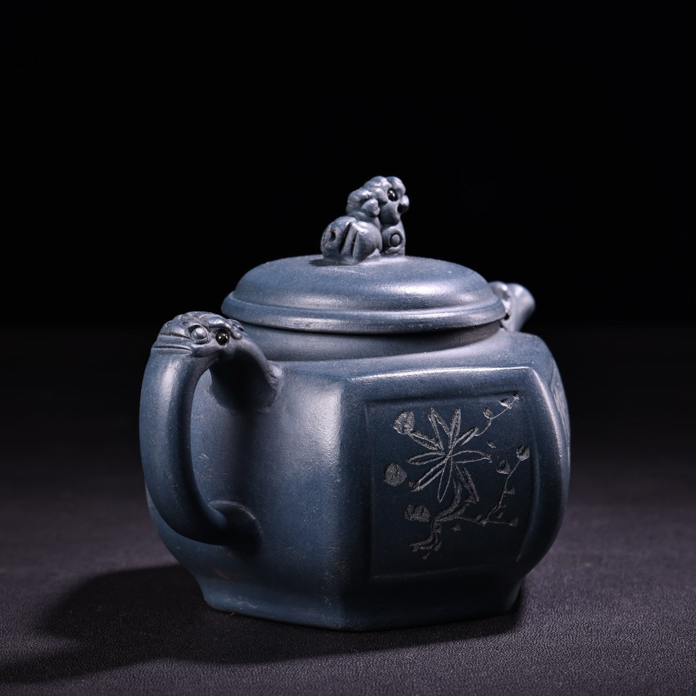 A handmade raw ore azure purple clay teapot