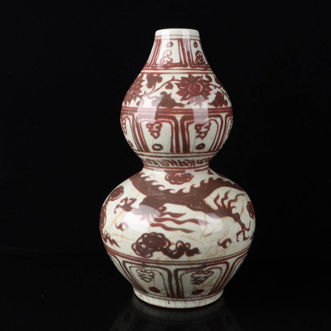 A pair of cloud and dragon patterned gourd bottles