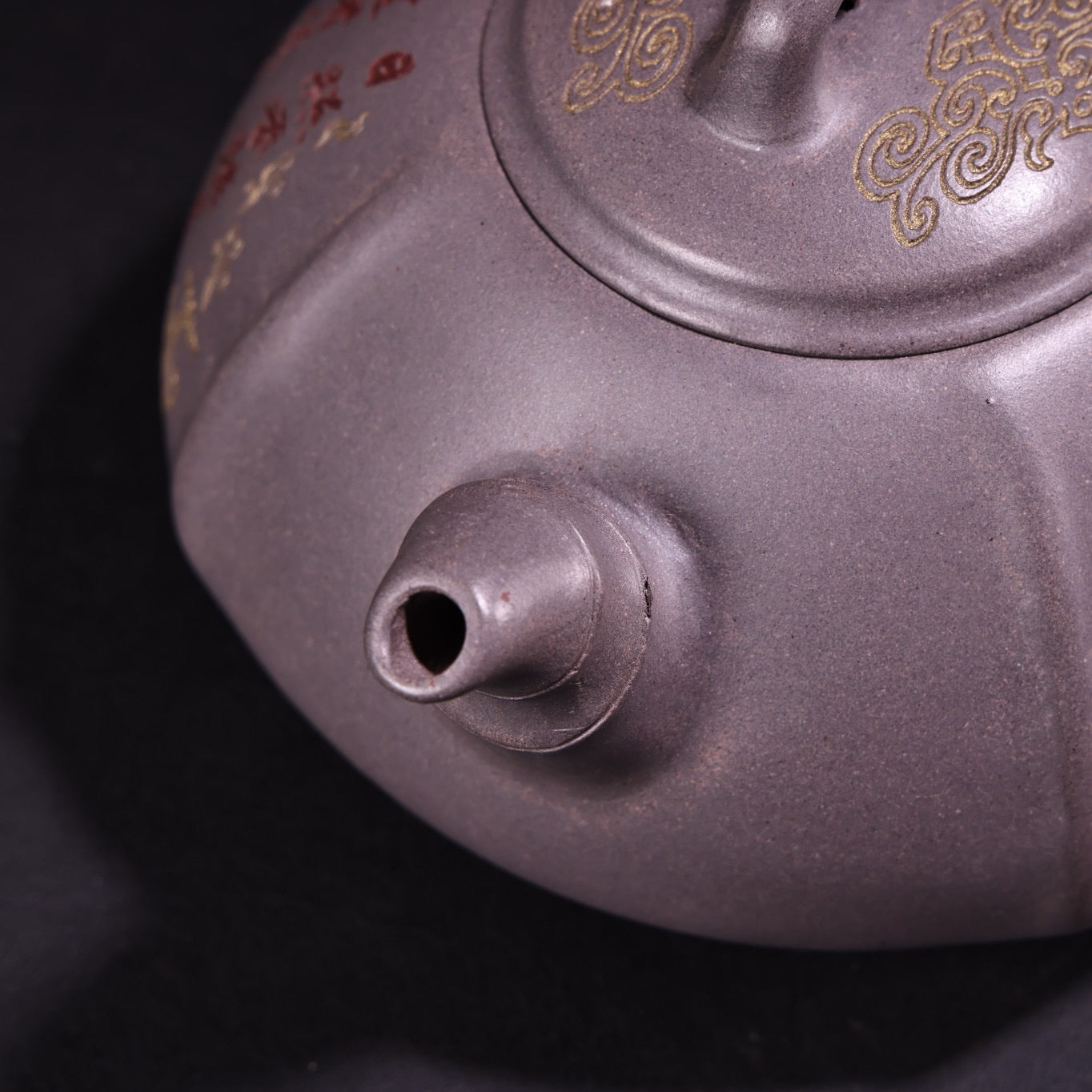 A handmade sky blue purple clay teapot