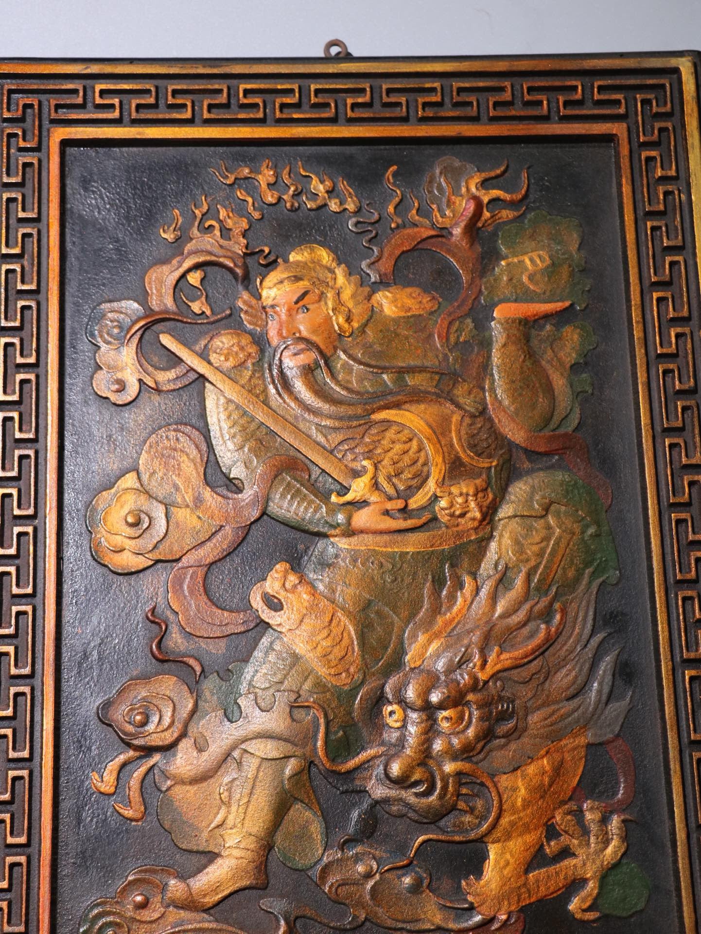Old wooden tire painted with gold, featuring a pair of door gods named Wei Chi Gong and Qin Shu Bao