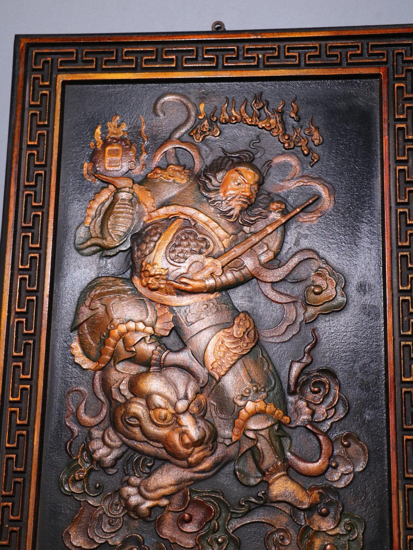 Old wooden tire painted with gold, featuring a pair of door gods named Wei Chi Gong and Qin Shu Bao