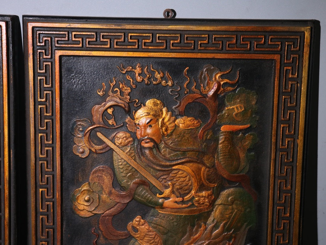 Old wooden tire painted with gold, featuring a pair of door gods named Wei Chi Gong and Qin Shu Bao