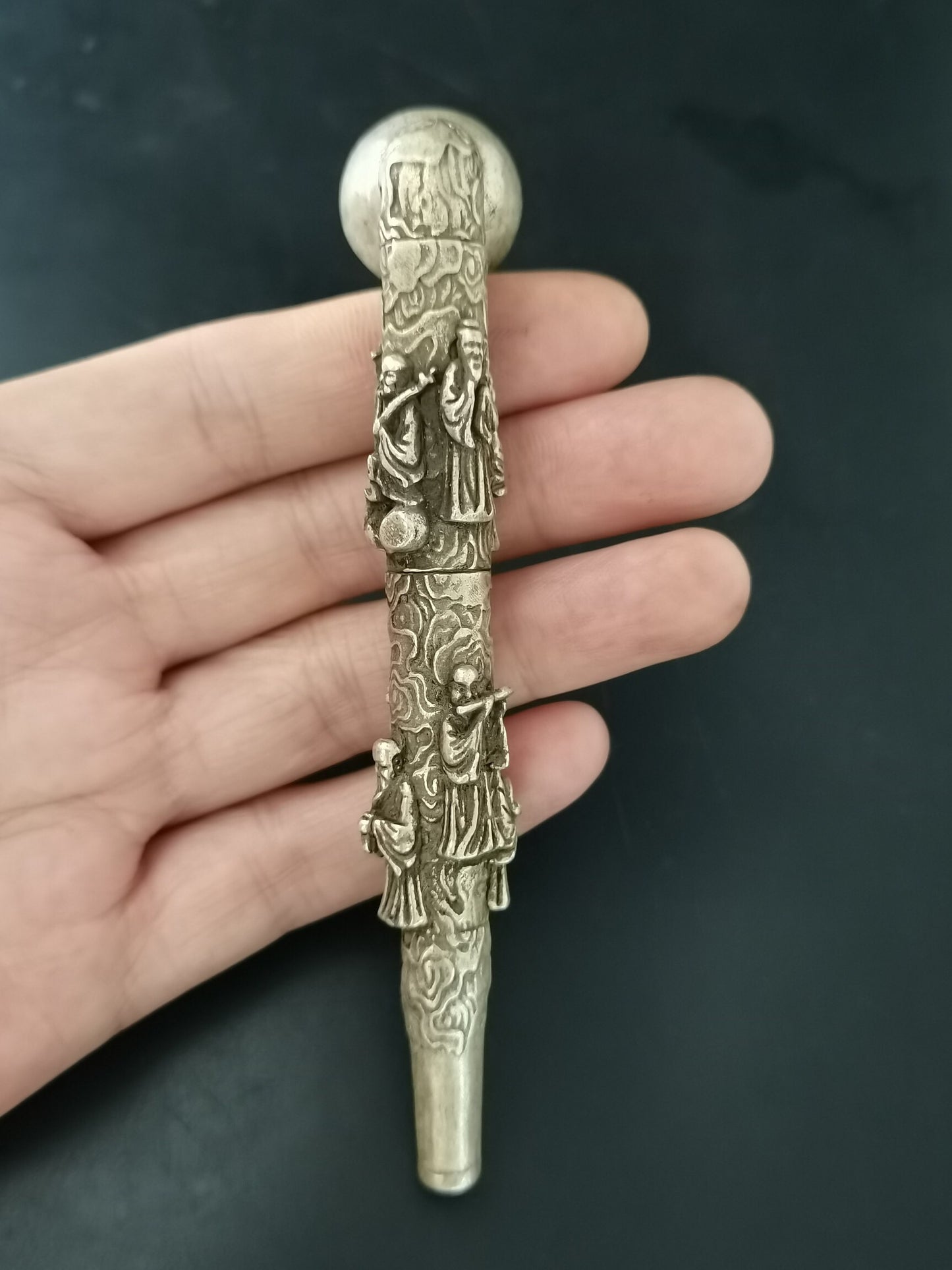 A Chinese antique silver Eight Immortals tobacco pipe