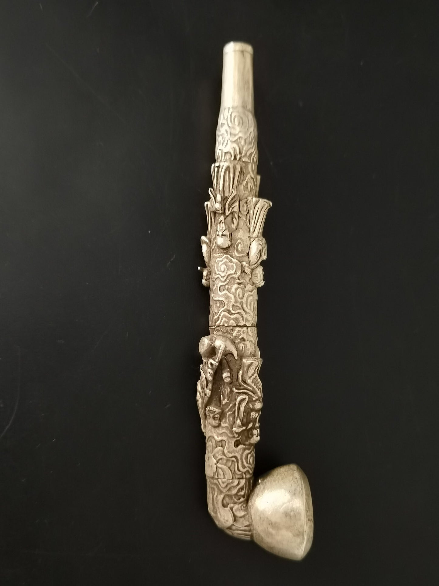 A Chinese antique silver Eight Immortals tobacco pipe