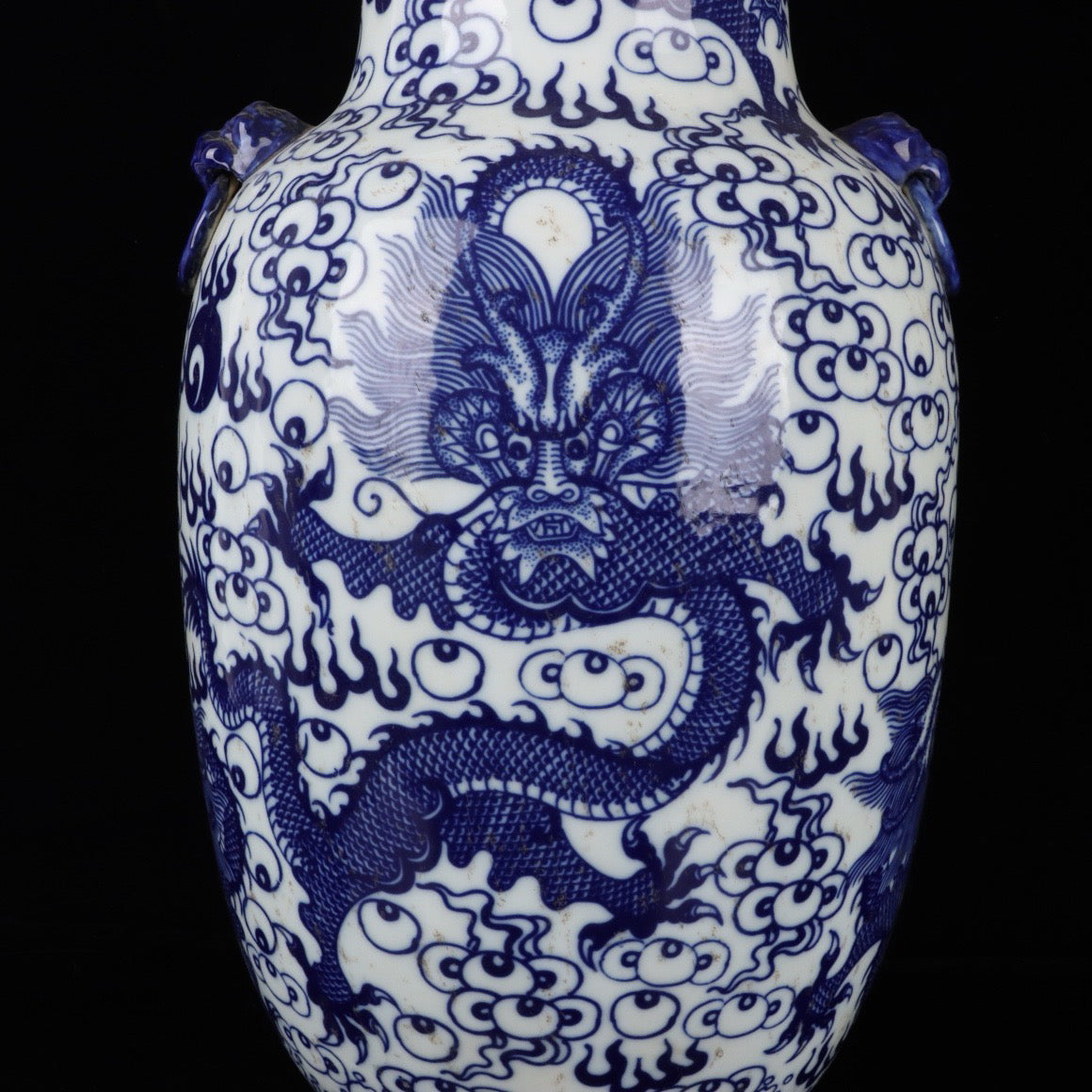 A pair of blue and white cloud dragon patterned beast ear bottles