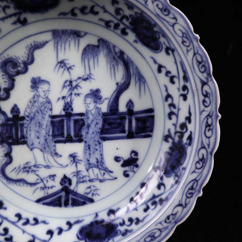 Blue and white character story pattern lace plate