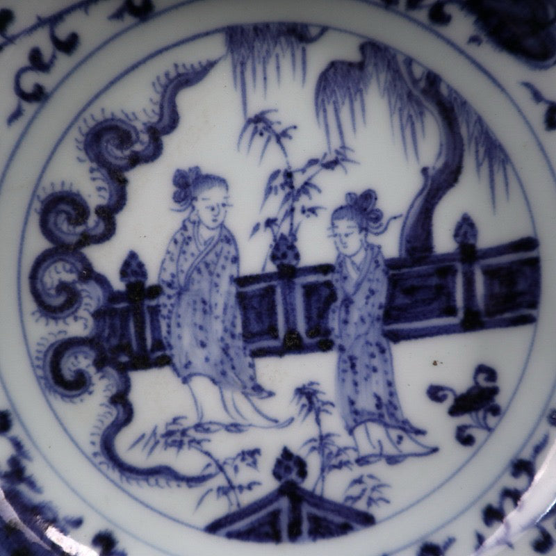 Blue and white character story pattern lace plate