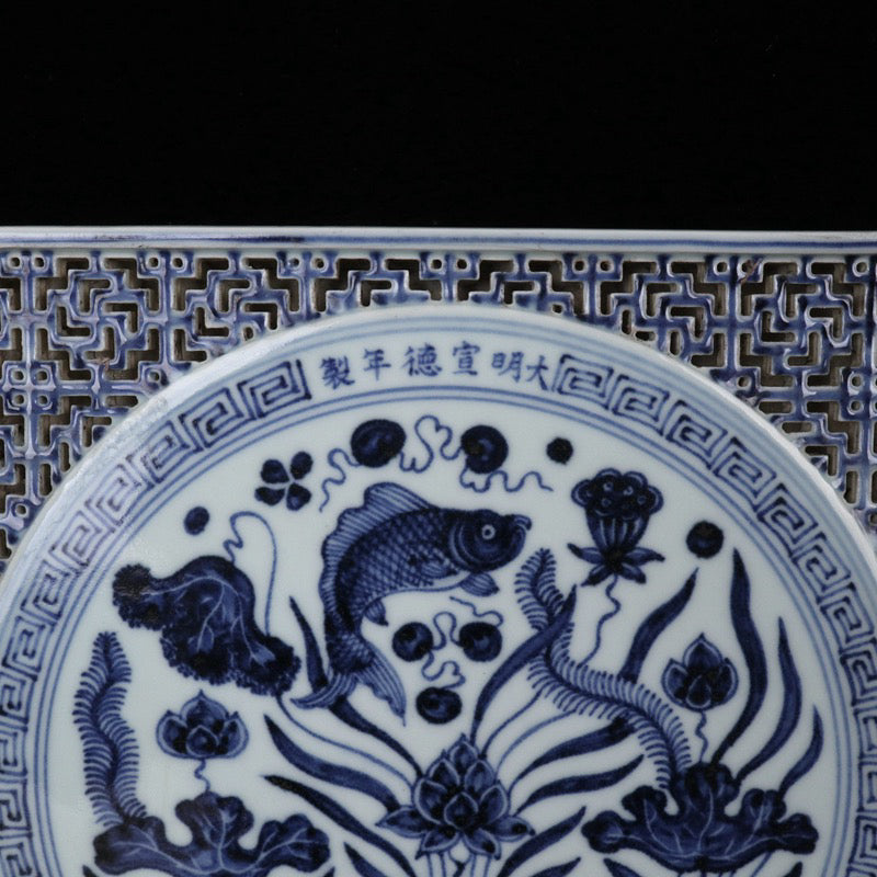 Blue and white square tea plate with fish and algae patterns