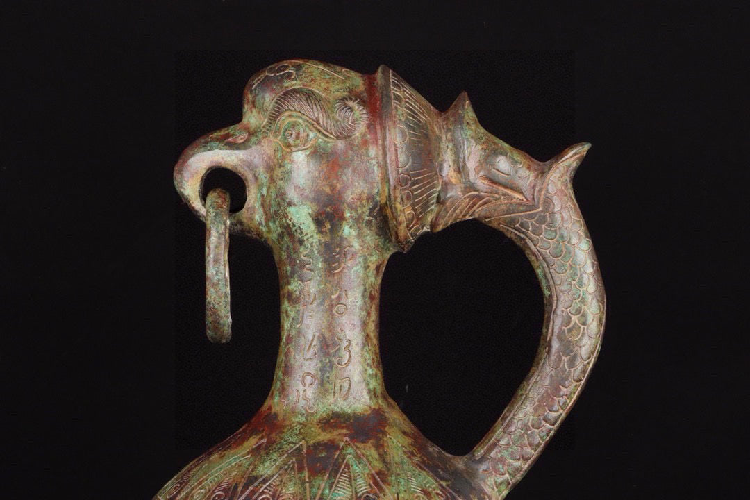 Chinese antique bronze full work eagle beaked human face teapot