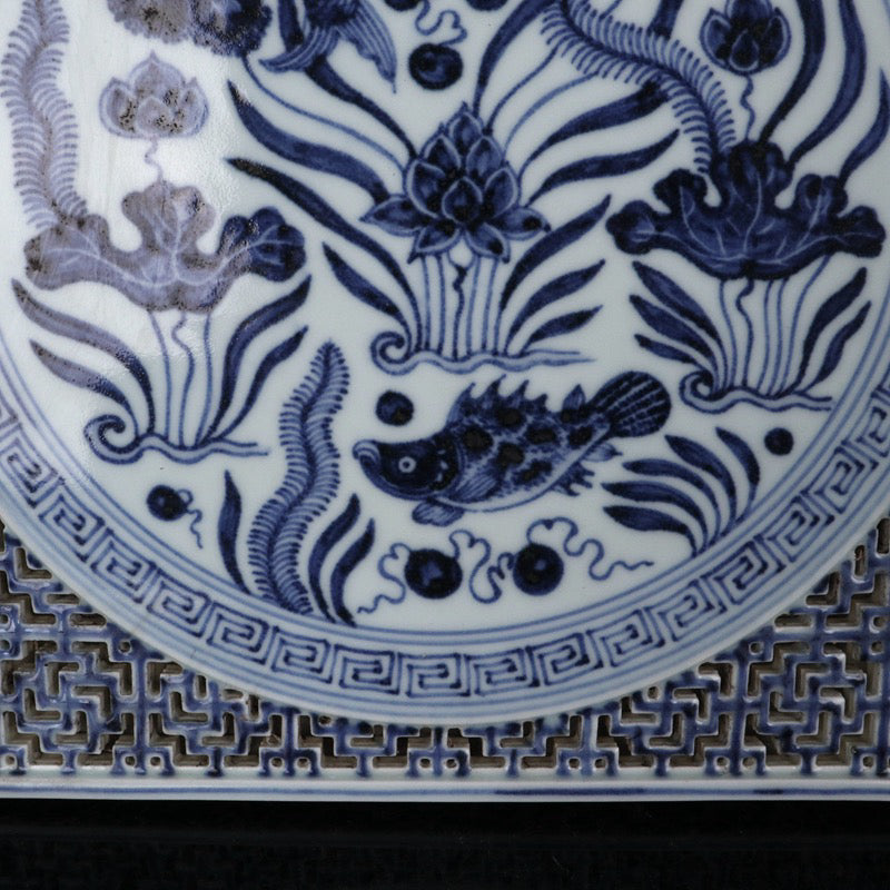 Blue and white square tea plate with fish and algae patterns