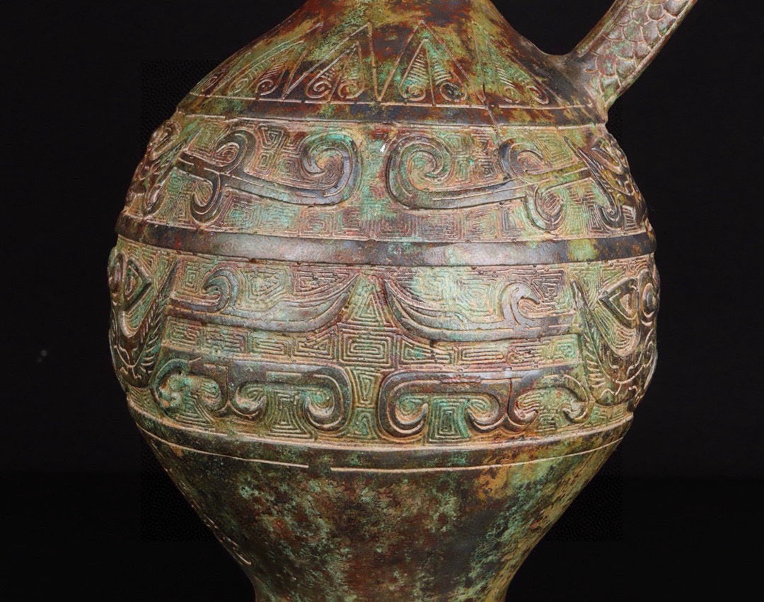 Chinese antique bronze full work eagle beaked human face teapot