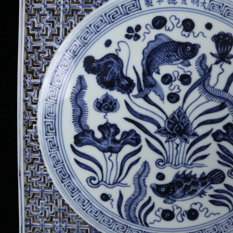 Blue and white square tea plate with fish and algae patterns