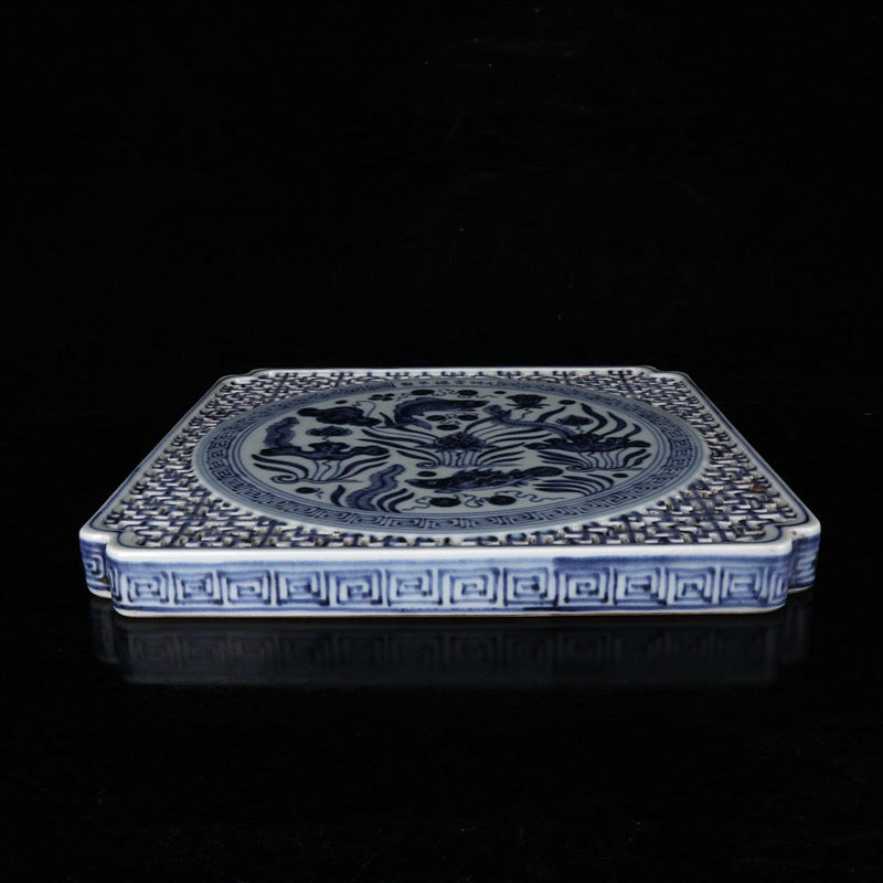 Blue and white square tea plate with fish and algae patterns