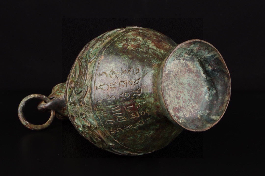 Chinese antique bronze full work eagle beaked human face teapot
