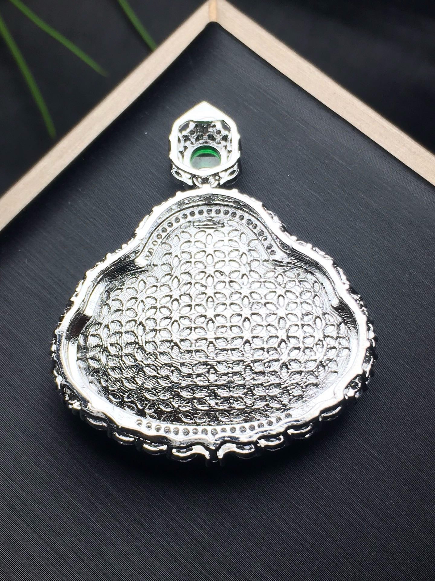 Ice green back cover inlaid with Buddha statue