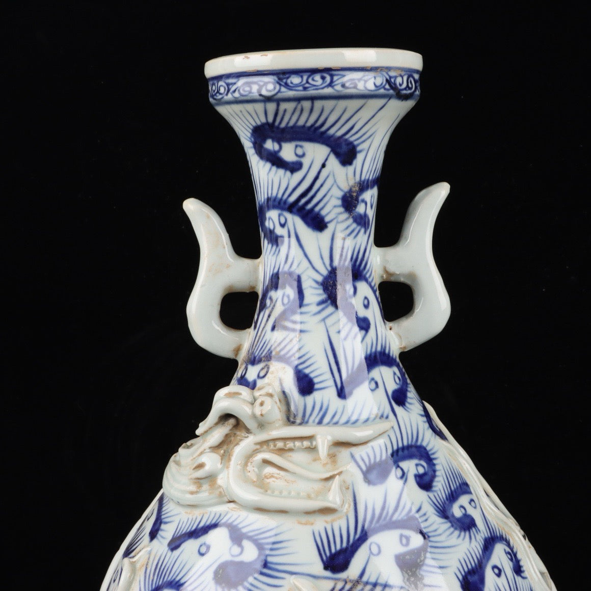 Blue and white relief cloud dragon patterned double ear vase