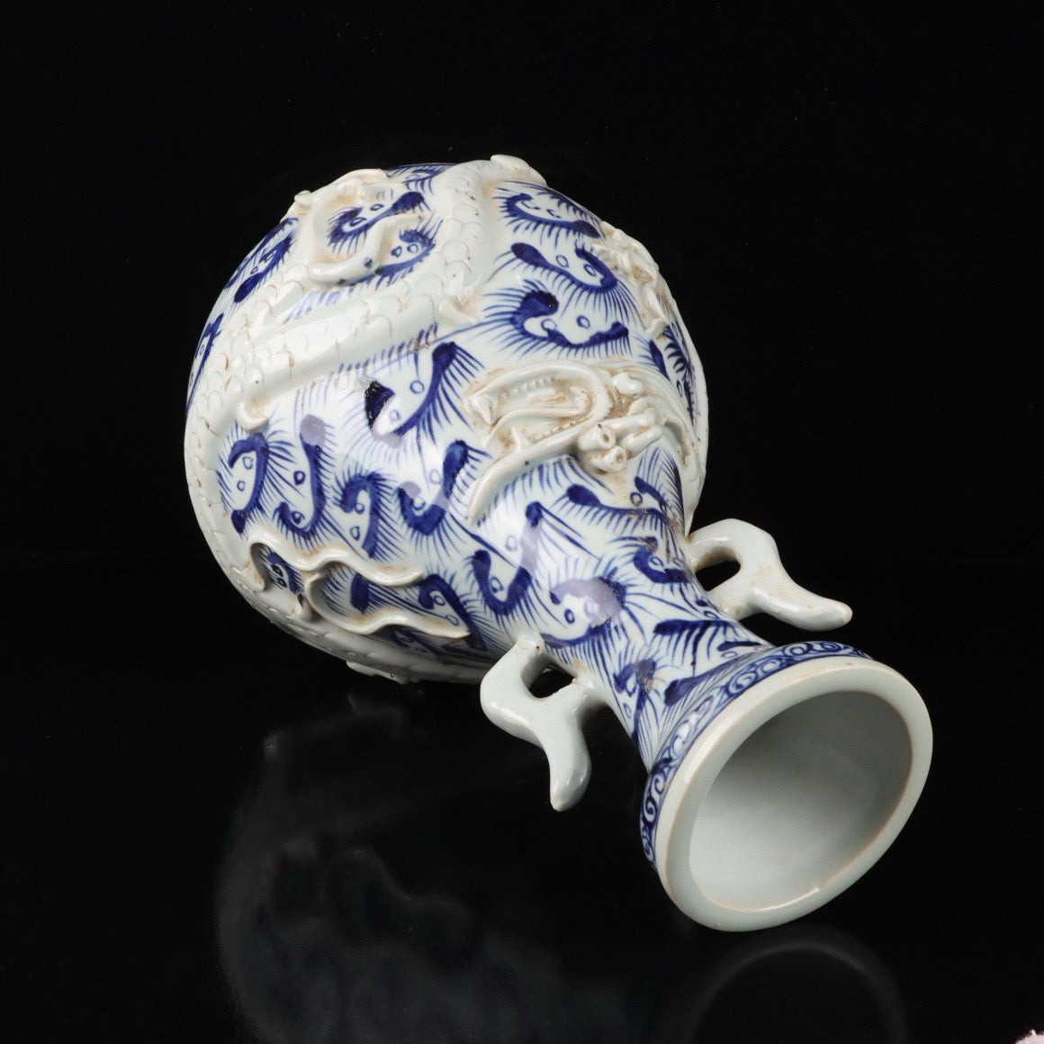 Blue and white relief cloud dragon patterned double ear vase