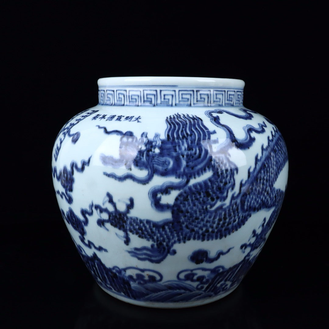 A pair of blue and white cloud dragon patterned jars