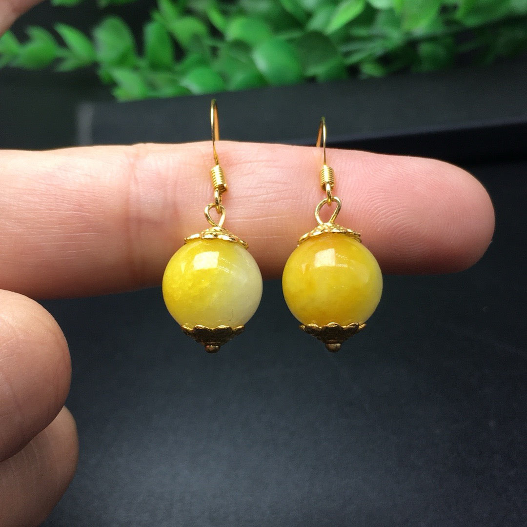 Sugar yellow round bead jade earrings