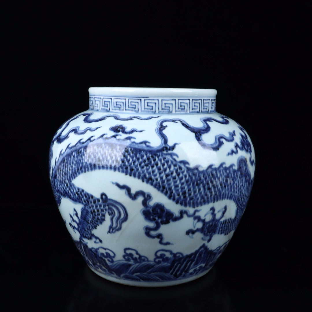 A pair of blue and white cloud dragon patterned jars