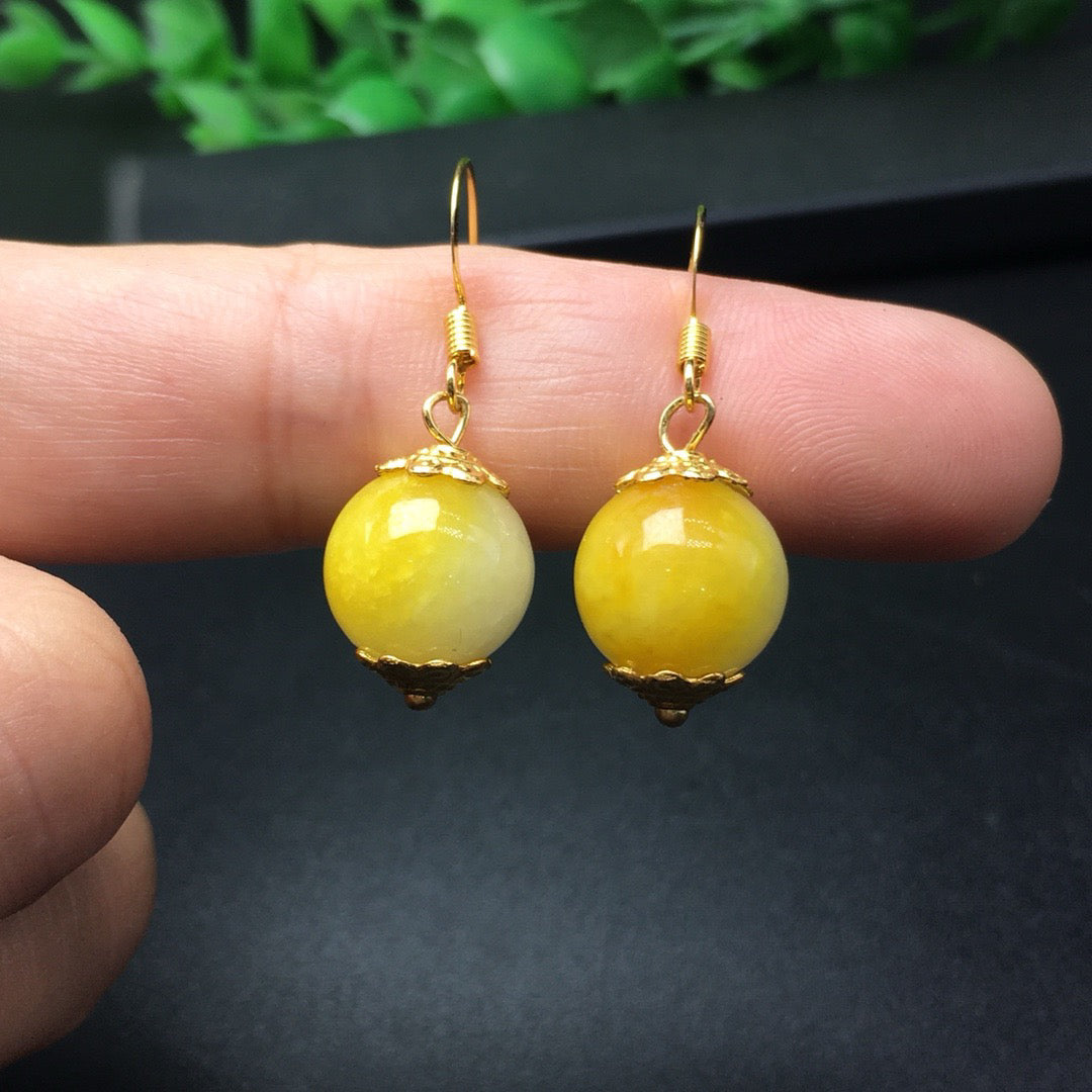 Sugar yellow round bead jade earrings